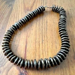 A unique choker necklace.